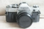 98 new American Canon AE-1 + 50 1.8 bộ của túi máy ảnh phim Shun Feng để gửi pin may anh sony