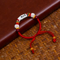 Собачья зубы+говяжья кость+оригинальная руда cinnabar+персиковые бусины