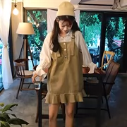 Váy mùa thu nữ 2018 mới của Hàn Quốc phiên bản của hoang dã màu rắn Một từ váy dễ thương xù chic strap dress
