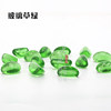 50 capsules of transparent glass grass green