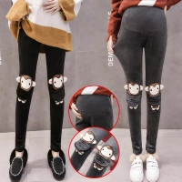 Bà bầu quần legging thu đông 2018 mới cộng với nhung dày thời trang hoạt hình thêu quần nâng bụng thông thường mặc quần bầu trắng