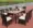Bàn ghế gỗ ngoài trời rắn wicker ghế năm mảnh bàn ăn ban công bàn ghế mây khách sạn đồ nội thất sân vườn bàn ghế nhựa
