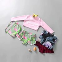 Áo tắm trẻ em Hàn Quốc áo chống nắng dài tay chia eo cao quần che bụng bé gái nhỏ đồ bơi dễ thương Đồ bơi bé - Bộ đồ bơi của Kid quần áo bơi trẻ em