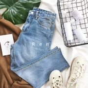 RENA Hàn Quốc mùa thu trắng Harlan phiên bản cao eo là mỏng hoang dã cơ bản đơn giản jeans rách cạnh chín quần