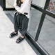 Streaky quần áo trẻ em của cậu bé màu rắn treo quần 2018 mùa xuân và mùa hè mới của Hàn Quốc phiên bản của đàn hồi quần harem quần trẻ em Mùa xuân