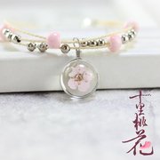 Shili Peach Blossom với Hoa Khô Sakura Everlasting Flower Thời Gian Đá Quý Vòng Đeo Tay Sen nữ Handmade Dệt Kim Peach Bracelet