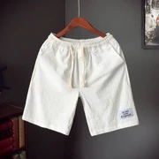 Mùa hè 2018 mới lanh quần short giản dị nam cộng với quần béo rộng size rộng bãi biển phiên bản Hàn Quốc của xu hướng quần nam
