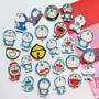 Phim hoạt hình dễ thương Doraemon trâm Túi quần áo trang trí pin nhỏ leng keng huy hiệu máy mèo trâm - Trâm cài ghim cài áo cao cấp