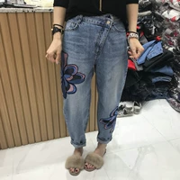 O Marie Korea Dongdaemun Women 2018 Mùa thu Mới Quần jean thêu hoa không đều quần jean ống rộng nữ