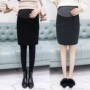 Phụ nữ mang thai mùa thu đông mặc váy len mới trong phần dài của phiên bản Hàn Quốc của mẹ một nửa váy mùa thu điều chỉnh đầm bầu tay ngắn
