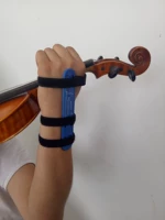 Настройка устройства для упражнений на запястье для скрипки