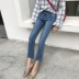 Mùa xuân nữ Hàn Quốc phiên bản của Hồng Kông hương vị chic gió retro irregular micro-la quần đa năng cao eo là mỏng chín điểm jeans triều chân váy bò Quần jean