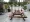 Biệt thự sân ngoài trời sắt rèn bàn ăn và ghế gỗ đồ gỗ ngoài trời ban công ngoài trời vườn kết hợp giải trí bộ - Bàn ghế ngoài trời / sân