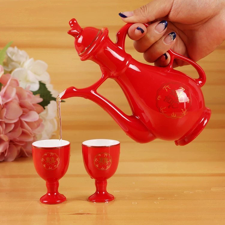 Hip bình đặt kính cưới tay trong ly thủy tinh đám cưới cặp rượu cưới đôi hạnh phúc Trung Quốc đỏ cung cấp gốm sứ mới - Rượu vang