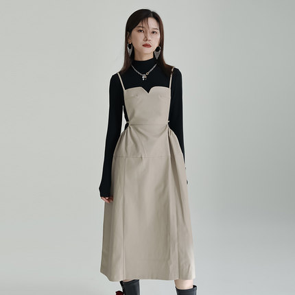 不規則PU皮キャミソールワンピース女性の秋冬の新ファッションデザイン感小人数ゆったり着やせスカート