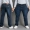 Quần jean nam mùa thu béo cộng với phân bón Quần tây đen XL quần lửng ống thun nam co giãn cao quần tây nam