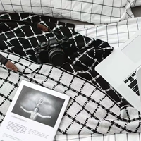 Nordic hình học màu đen và trắng bông dệt kim đơn sofa bìa chăn mền chăn bình thường máy lạnh văn phòng chăn khăn choàng chăn - Ném / Chăn mền nhung mỏng