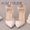 Giày cưới ngọc trai trắng mới rhinestone màu đỏ mũi nhọn siêu cao gót giày cưới một từ cổ tay ban nhạc stiletto phụ nữ dép adidas