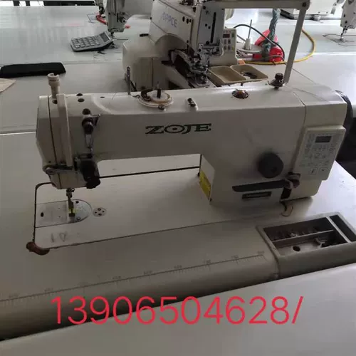 Промышленник с плоским автомобилем использует второй компьютерный швейный станок в стандартном внутреннем импортном швейном машине Jiejie