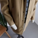 Người đàn ông có xương sống của Nhật Bản lỏng lẻo trùm đầu viền áo lót draping cắt áo len lông áo phao nam hàn quốc Áo len