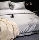 Mới của Trung Quốc hiện đại nhỏ gọn mô hình phòng giường sản phẩm 60 bông thêu hoa bốn bộ bông 1.8m giường Bộ đồ giường bốn mảnh