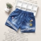 Quần short denim cho bé gái mùa hè mới ra ngoài mặc quần nóng học sinh tiểu học Phiên bản Hàn Quốc của quần hoang dã - Quần jean