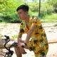 Hawaii áo sơ mi ngắn tay của nam giới beachwear nam bộ dừa áo của phụ nữ in vài mặt trời quần áo bảo vệ đảo Hải Nam quần áo Áo