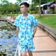 Hawaii áo sơ mi ngắn tay của nam giới beachwear nam bộ dừa áo của phụ nữ in vài mặt trời quần áo bảo vệ đảo Hải Nam quần áo Áo